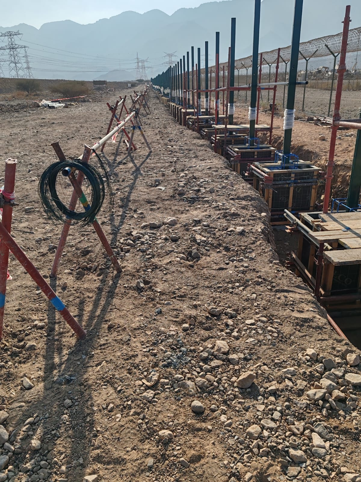 Cable trenching and laying work for telecommunications.